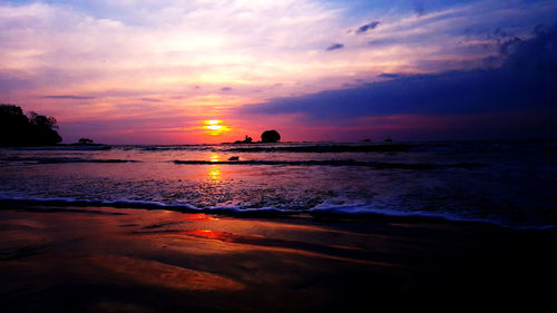 Dramatic sky over sea during sunset