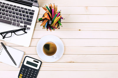 Directly above shot of coffee cup on table