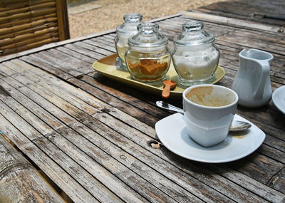 Coffee and shakers on table