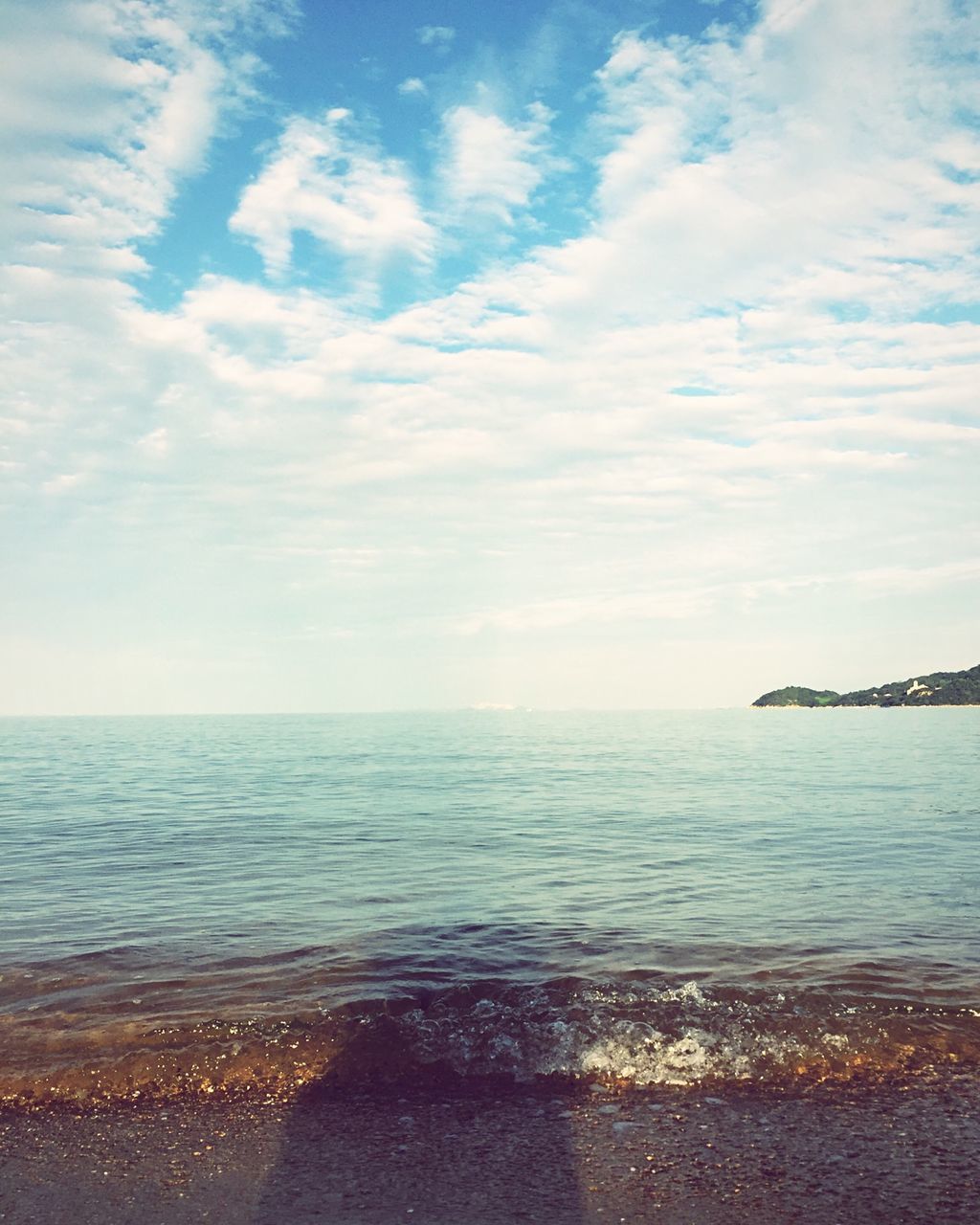 sea, water, horizon over water, sky, scenics, tranquil scene, tranquility, beauty in nature, beach, cloud - sky, nature, shore, cloud, idyllic, blue, seascape, wave, rippled, outdoors, day