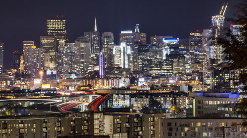 Illuminated cityscape at night