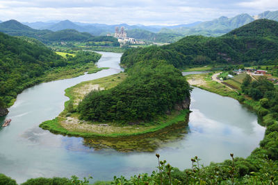 High angle view of river amidst mountains