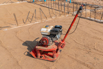 Compactor machine on sand at a construction site. equipment for soil thrombosis.