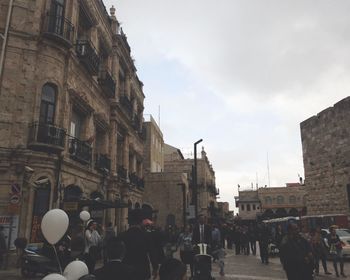 People in front of building