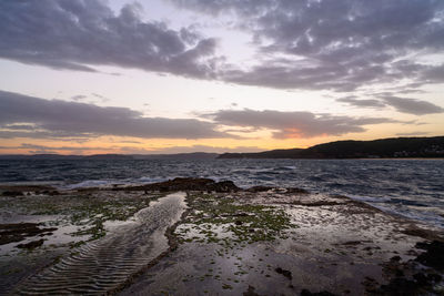 Scenic view of sea against sky during sunset