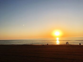 Scenic view of beach during sunset