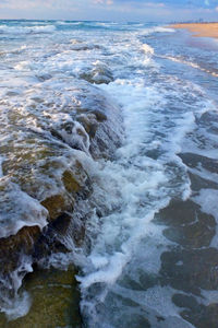 Waves flowing through rocks