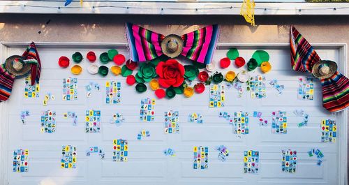 Multi colored decorations hanging on wall