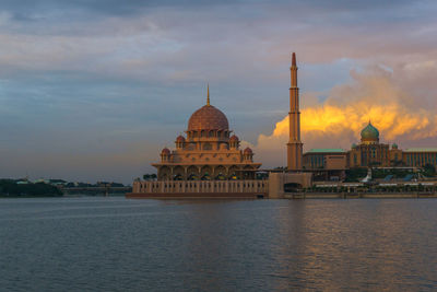 View of temple against cloudy sky