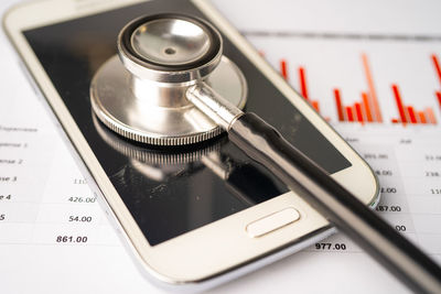 High angle view of mobile phone on table