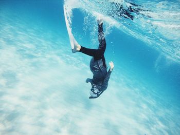 Man swimming in sea