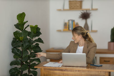 Woman working at home with laptop. home office.  notebook for working. 