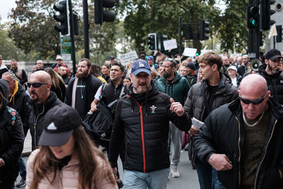 Group of people on street in city