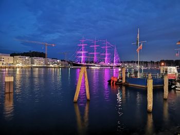 Reflection of illuminated buildings in water