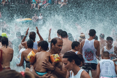 Group of people at swimming pool