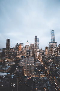 Buildings in city against sky