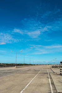 Empty road against sky