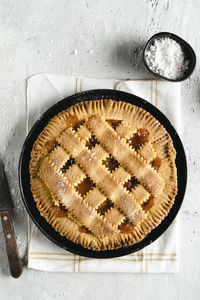 Homemade, rustic, crostata sweet pie with apricot marmalade. to view. copy space.