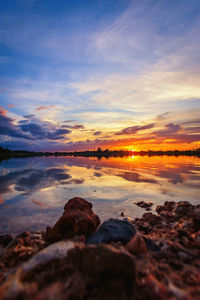 Scenic view of sea against sky during sunset