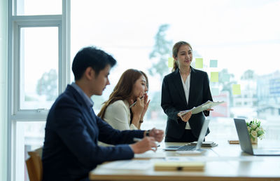 Business colleagues working at office