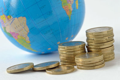 Close-up of coins on table