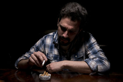 Portrait of a man holding ice cream
