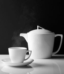 Close-up of coffee cup on table