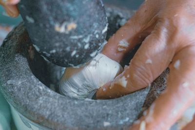 High angle view of person preparing food