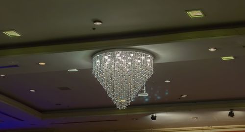 Low angle view of illuminated lamp