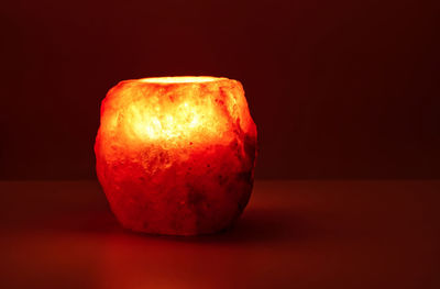 Close-up of apple against black background