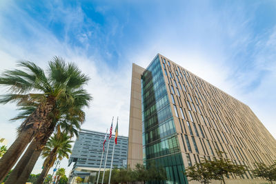 Low angle view of modern buildings against sky