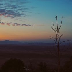 Scenic view of silhouette landscape against sky during sunset