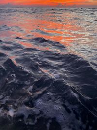 High angle view of sea shore during sunset