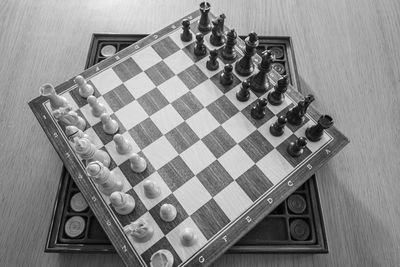 High angle view of chess board on table