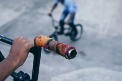 Close-up of hand of a man at skatepark