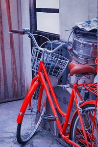 Bicycle parked in front of building