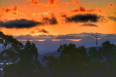 Scenic view of mountains at sunset