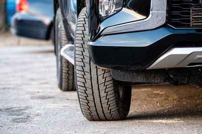 Close up of parked car on a city street side, selective focus