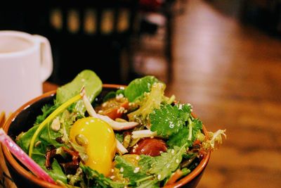 Close-up of salad in bowl on table