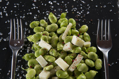 Close-up of vegetables and cheese on table