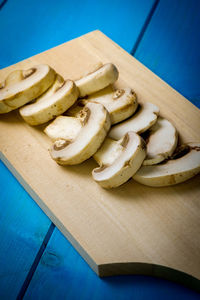 High angle view of bread on cutting board