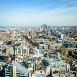 High angle view of buildings in city against sky