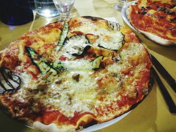 Close-up of pizza served on table