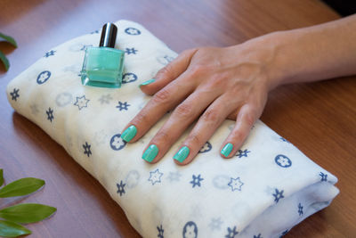 Close-up of woman hand with nail polish