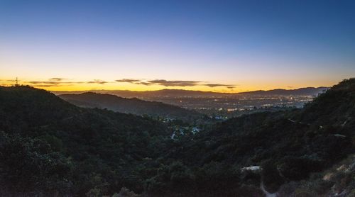 Scenic view of mountains at sunset