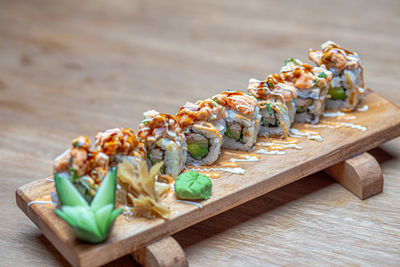 Close-up of sushi on cutting board