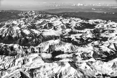 Aerial view of landscape and mountains against sky