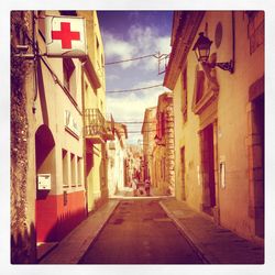 Narrow alley along buildings