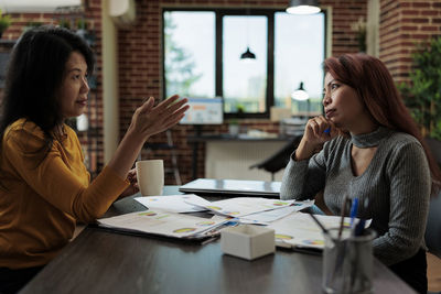 Businesswomen brainstorming at office