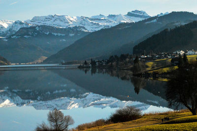 Scenic view of snowcapped mountains against sky